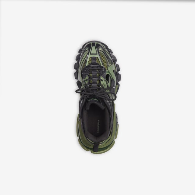 Balenciaga Logo at Back Lace Up. 75% polyurethane, 21% polyester, 4% nylon.