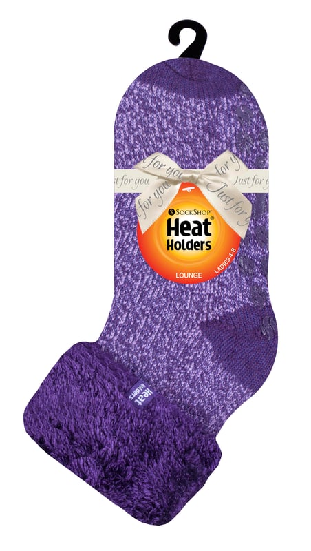 Lounge around the home in these cosy socks. Whether you're looking to stay warm or comfortable indoors, these lounge socks feature a cute and stylish design so you can pair them with any casual outfit! Every Heat Holders® sock, including these lounge socks, are created by UK PATENTED knitting technology. This unique manufacturing process together with Heat Holders® innovative Japanese designed thermal yarn ensures maximum warmth is held close to the skin, keeping your feet warmer for longer. With a strong TOG rating of 2.34, these socks are designed to keep your feet warm as well as retain heat close to the skin. They also prevent your feet from feeling clammy with their soft brushed inner thermal lining. With long pile cushioning, these thermal socks will help keep feet fully comfortable and supported. Heat Holders are made from a specially developed heavy bulk yarn which has extreme thermal-like qualities. These socks would make the perfect gift for any woman who suffers cold feet! Choose from our different colours and styles to suit your woman's fashionable needs! Why not treat yourself to these lovely pair of cosy socks to wear in bed? Featuring a turn over cuff, you can pull up or roll down these socks for a much more comfortable fit! These socks also have a low cut ankle length so you can subtly show off your socks! Stop sliding or slipping on wooden or tiled floors with these non-slip gripped socks. They feature a rubber-like non-slip grip so you can walk around the home comfortably. These socks are available in womens sizes 4-8 UK