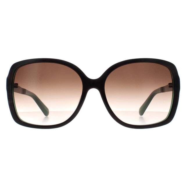 Kate Spade Buttefly Womens Brown Horn Jade Brown Gradient Darilynn/S  Sunglasses are crafted from high-quality acetate, the frames are both sturdy and lightweight, providing comfort without compromising on style. The lenses ensure comprehensive UV protection, shielding your eyes from harmful rays while offering crystal-clear vision. Accented with the iconic Kate Spade logo on the temples, the sunglasses exude a sense of understated luxury, perfect for adding a sophisticated touch to any ensemble.