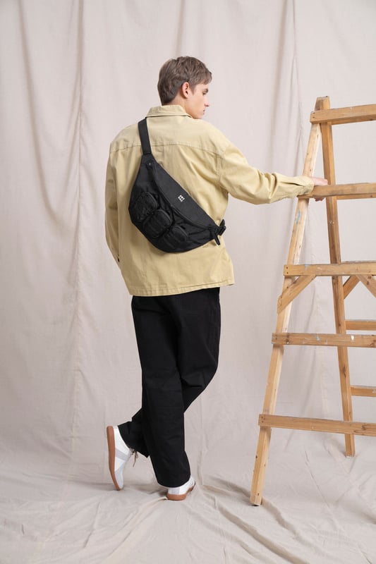 Our medium-sized backpack made in our Contore nylon fabric. This lightweight backpack has plenty of internal space as well as a unique triple-pocket design and internal laptop sleeve (fits 13 inch Macbook Pro). It's stylish design is discreet and adaptable enough to style with any outfit. The perfect bag for your every day commute or casual day-trip. Features: , Water Resistant Contore nylon fabric, 13 inch padded laptop sleeve, Zip top opening to main compartment, Triple front zip pocket with webbing loops, Internal zip pocket for smaller valuables, 2 Internal mobile phone slip pockets - Fits normal and plus size smart phones, 3 Internal pen slip pockets, ARTSAC seal of approval rubberised patch logo, Ergonomic contoured back panel, Adjustable padded backpack straps, Top grab handle, Medium model Style Ref: 52001 BLACK