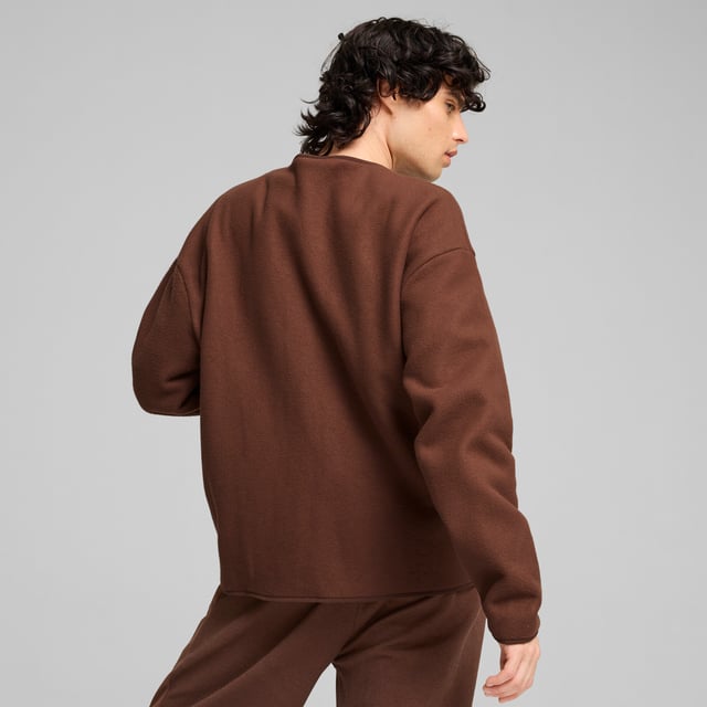 PRODUCT STORY: Make a statement in premium comfort and style. This full-zip cardigan delivers a relaxed yet refined fit, perfectly suited for life's everyday adventures. Thoughtfully designed details like the contrast zipper and subtle stitching on the cuffs add an elevated finish, keeping you looking sharp whether wandering the city or escaping to the countryside. FEATURES & BENEFITS: Made with at least 90% recycled materials; warmCELL: Breathable cold weather technology designed to trap heat close to your body and keep you warm during exercise. DETAILS: Relaxed fit; 270 gsm, polar fleece; V-neck; Button placket; Top stitching design element.  Our model is  180 cm tall and is wearing size  M UK.