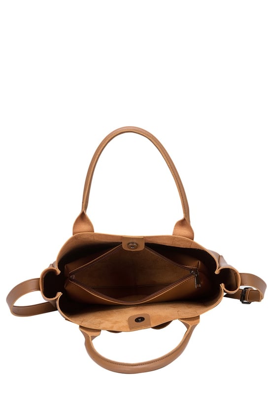 Be anything but basic with this classic wardrobe staple. The Megan XL Tote is the perfect accessory for making a statement and is highly functional too. Inside is a spacious compartment, big enough to carry the days essentials. You can also find a pouch which can be removed, ideal for storing items you want to keep extra secure, or use it as a mobile makeup bag! You have a choice of styling with the tote grab handles and the adjustable shoulder strap, so you can change your look depending on your chosen style! Features: , Lightly textured PU exterior, Claudia Canova debossed logo, Magnetic clasp fastening, Two exterior slip pockets, 2 x tote grab handles, Adjustable shoulder strap, Interior pouch which can be removed using the snap button clasps, Pouch measurement: W 304 x H 203 x D 63 mm, Zip top fastening on interior pouch Style Ref: 84607 TAN