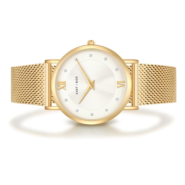 GENERAL INFORMATION:  • Targetgroup: Female  • Wristwatch: No Special Functions  • Display: analogue  • Weight of watch w/o box (gr.) - approx.: 48,0  MOVEMENT:  • Movement: Quartz  • Term of Movement: 2025  • Origin of movement: Japan  BRACELET:  • Material of bracelet/strap: Stainless steel  • Plating of bracelet/strap: Ion-Plating (IP)  • Finishing of bracelet/strap: Smooth  • Finishing/Decoration of bracelet/strap: None  • Clasp/Closure/Buckle: Slide Clasp  • Color of bracelet/strap: Yellowgold  • Length of bracelet/strap (mm) approx.: 200,0  • Width of bracelet/strap (mm) approx.: 17,6  • Style/Design of bracelet/strap: Mesh band (Millanaise Style)  • Bracelet/strap adjustable?: No  CASE:  • Shape of case: Round  • Size/Diameter of case in mm . approx.: 33,0  • Height of case in mm: 6,7  • Case material: Metal (Alloy)  • Surface of case: Polished  • Bezel/Topring: Fixed  • Finishing/Decoration of case: None  • Material of case back: Stainless steel  • Lock of case back: No screwed-in crown  • Color of case: Yellowgold  • Coating/Plating (Case): Ion-Plating (IP)  • Type/Form of crystal: Flat  • Material of crystal: Mineral crystal  • Water resistant (ATM): 3  DIAL:  • Size jewelry care cloth: Hour, Minute  • Indices: Roman numerals/points  • Material of dial: Brass  • Structure/pattern of dial: sunray  • Color of dial: White  PUSHER, CROWN, HAND:  • Pusher: None  • Corrector: No  • Crown: No screwed-in crown  • Type of hands: Dauphine hands  • Luminescent (hands): No  PACKAGING & SCOPE OF DELIVERY:  • Box: Yes  • Service booklet: Yes  • Manual: Yes