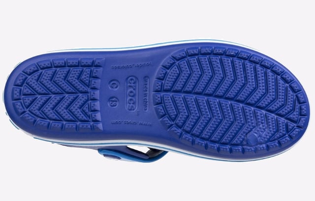 They will dazzle in our kids sandal with cute colours and a comfy fit. Jibbitz charm holes let them add a personal touch.
- Sporty Crocband style for little ones
- Croslite material cushions and comforts
- Heel and ankle strap for a more secure fit
- Comfort Rating: Iconic