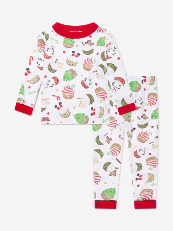 Introducing the Kids Festive Cupcakes Long Pyjamas by Magnolia Baby! A delightful addition to any unisex wardrobe, it's perfect for Christmas. Key features include: Festive Design: With a whiff of joyous festivities, the Cupcake pattern makes a fun, stylish statement. Luxurious Comfort: Crafted using superior materials for utmost softness &amp; comfort, ensuring sound sleep. Wardrobe Wonder: A vibrant splash of Red, this piece revitalises your kid‚ nightwear collection. Don't wait ‚ order today for standout style!