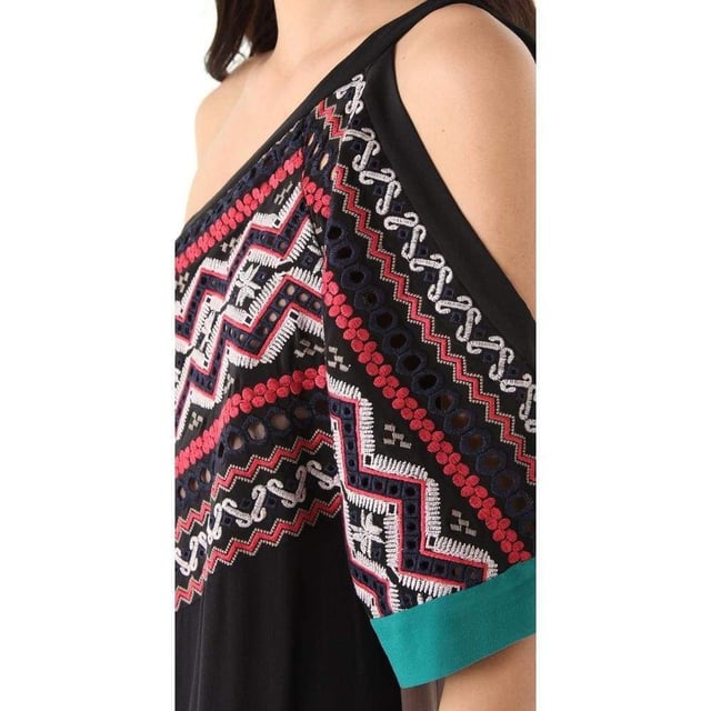 Mixed embroidery boldly accents this one-shoulder silk dress. Pockets hide on the side seams While sheer mesh and solid chiffon trim the hem. A relaxed side slit offers effortless movement. Thin strap and cutout short sleeve. Lined. Fabric: Washed silk crepe. Shell: 100% silk. Lining: 100% polyester. DHand wash cold.