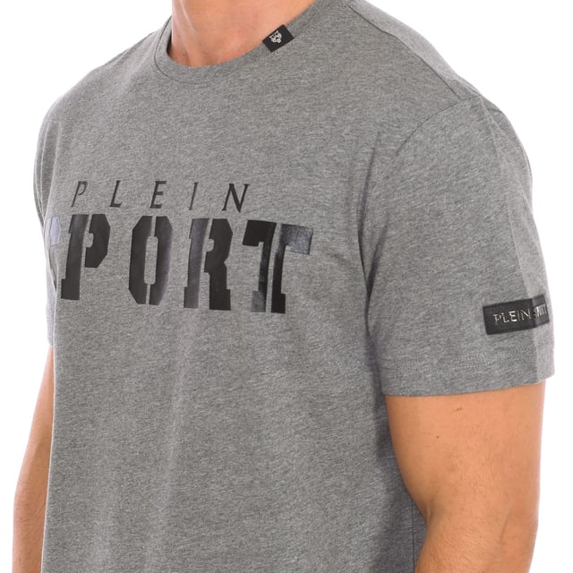 Plein Sport short sleeve t-shirt.
 Round neckline with ribbed finish.
 Brand print on the front.
 Claw print on the back side.
 Brand insignia on one sleeve.
 Seams seen in tone.
 Composition: 100% cotton
 Care:
Wash at maximum temperature 30º.
 Iron at medium temperature.
 Do not use dryer.
 Do not use bleach.
 Do not dry clean.