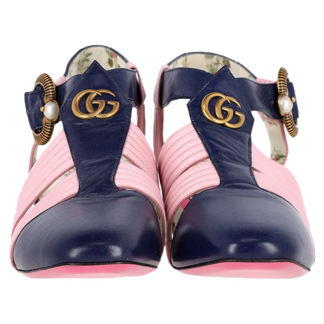 VINTAGE, RRP AS NEW
Step into luxury with the Gucci GG Logo T-Strap Mid-Heeled Sandals in vibrant blue and pink leather. These eye-catching sandals feature the iconic GG logo, beautifully blending high fashion with playful color. The T-strap design provides a flattering silhouette, while the mid-heel offers comfort and stability for all-day wear. Perfect for dressing up a casual outfit or adding flair to an evening ensemble, these sandals are a versatile addition to your footwear collection. Elevate your style and make a bold statement with these stunning Gucci sandals.

Gucci GG Logo T-Strap Mid-Heeled Sandals in Blue and Pink Leather

Condition: Very good
Signs of wear: Minor signs of wear
Packaging: Dust bag
Color: Multicolor
Material: Leather | leather
Size: EU36.5/UK3.5/FR37.5/IT36.5/US6.5
Measurements: Heel height: 80; Insole length: 260
SKU: NAPPUGBSH400793W