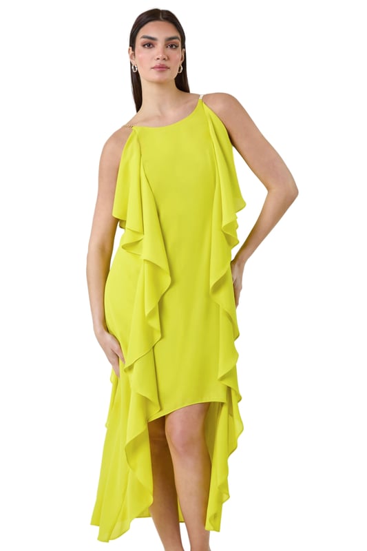 Plain Dipped Hem Ruffle Detail Midi Dress from Roman. Elevate your Summer wardrobe with this striking ruffle detail midi dress from the Ariella range. Featuring a elegant, cascading waterfall ruffle detail, this dress has a striking hi-low silhouette to add a touch of drama to your occasionwear. This sleeveless dress with a concealed back zip fastening is crafted from plain woven fabric and fully lined for maximum comfort. The metal trim on the shoulder straps provides a sophisticated edge. Whether you're attending a wedding or a formal dinner, style it with strappy heels and a clutch bag for event-ready glamour!