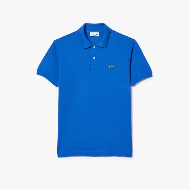 inchLacoste  inventor of the polo since 1933 Original L.12.12 Polo. Made by Lacoste. The Icon. Collar  button placket  petit piqué fabric - these are the components thought by René Lacoste. Yes  René did it first. 90 years ago  he challenged the status quo by creating the first polo to bring more freedom of movement on and off court. And put a crocodile at heart  making Lacoste the first brand who put a logo on clothing. Classic fit  comfortable ease on body and sleeves Original L.12.12 polo in our iconic petit pique renewed every season in a new large color palette. The Petit Piqué fabric is a Lacoste signature. It made of fibers knit together at two different levels of tension. The result? A finely honeycombed fabric that enables air to circulate freely. This fabric ensures comfort  ease of movement and elegance. Ribbed collar and cuffs Side slits Invisible hem Real mother of pearl buttons 3cm green crocodile at chest inch.