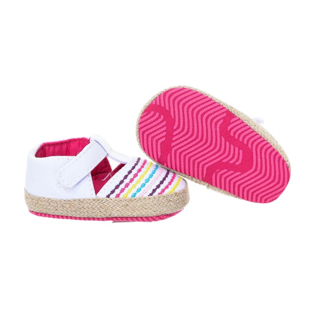 Soepele babyschoentjes.
 Bandsluiting op de wreef met klittenbandsluiting aan de zijkant.
 Zachte textiel binnenkant.
 Espartozool.
 Naden in toon zichtbaar.
 Samenstelling: Buitenkant: Textiel; Binnenkant: Textiel; Zool: Textiel
 Onderhoud:
Reinigen met een natte doek.