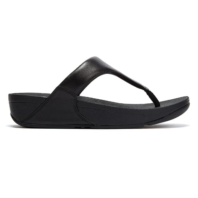 FitFlop Dames Lulu™ Sandalen - (Zwart) De Lulu™ sandalen van FitFlop zijn perfect voor het strand en de zomer. Slip on sandalen met leren bovenwerk en een Microwobbleboard™ tussenzool met driedubbele dichtheid die extra comfort biedt van schokabsorptie tot drukverspreiding. - APMA (American Podiatric Medical Association) Seal Of Acceptance om een goede voetgezondheid te bevorderen - Naadloos ingebouwd voetboogcontour - Slipbestendige rubberen buitenzool