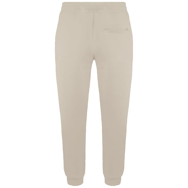 Experience comfort and streetwear style with the Criminal Damage Legacy Men's Sand Track Pants. These track pants combine a relaxed fit with urban-inspired design elements, making them a versatile addition to your casual wardrobe.

Key Features:

 Relaxed Fit:  The Legacy Track Pants boast a relaxed and comfortable fit, providing ease of movement and a laid-back look. Whether you're lounging at home or heading out for a casual outing, these track pants offer a comfortable and stylish option.

 Sand Color:  The sand colorway adds a touch of subtlety and sophistication to the track pants. The neutral tone allows for easy pairing with various tops and sneakers, making them a versatile choice for creating different outfits.

 Elastic Waistband:  The track pants feature an elastic waistband with an adjustable drawstring, allowing you to customize the fit to your liking. The elastic waist ensures a snug and secure feel, while the drawstring adds a functional and stylish detail.

 Side Pockets:  These track pants come with practical side pockets, providing space to carry small essentials or keep your hands warm during cooler days.

 Urban-Inspired Design:  Criminal Damage is known for its streetwear aesthetic, and the Legacy Track Pants embody that style with subtle brand details and design elements that exude urban coolness.

 Tapered Leg:  The pants have a tapered leg design, creating a modern and sleek silhouette. The tapered fit adds to their contemporary appeal and allows for easy pairing with both sneakers and casual shoes.

 Versatile Styling:  Whether you're relaxing at home, running errands, or meeting up with friends, the Criminal Damage Legacy Men's Sand Track Pants offer a trendy and effortless look suitable for a range of casual occasions.