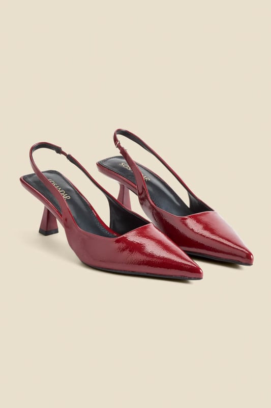 Accessories on point Crafted from luxe crinkle leather in a stunning cherry red patent finishChic slingback with an elasticated insert for a comfortable fit Sexy pointed toe silhouetteSet on a super-wearable flared kitten heel We love them with jeans and a blazer