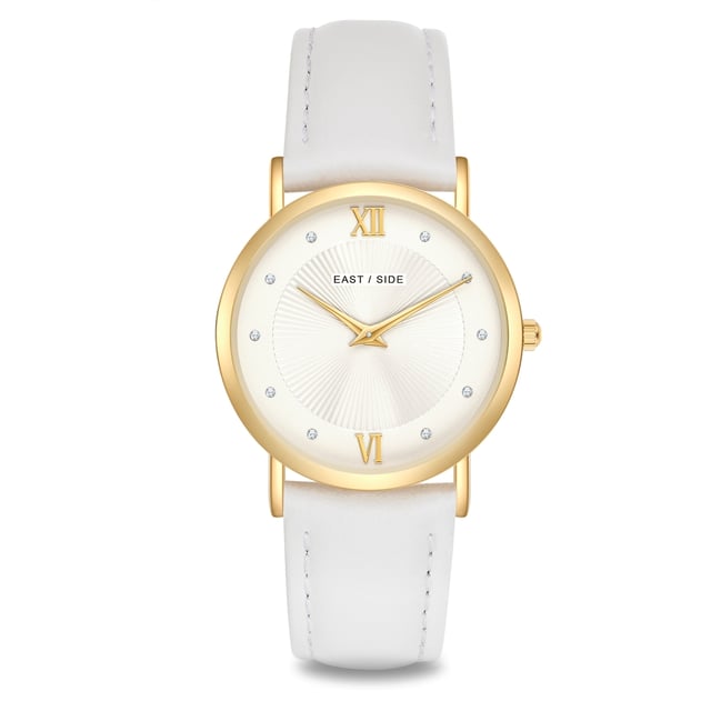GENERAL INFORMATION:  • Targetgroup: Female  • Wristwatch: No Special Functions  • Display: analogue  • Weight of watch w/o box (gr.) - approx.: 27,0  MOVEMENT:  • Movement: Quartz  • Term of Movement: 2025  • Origin of movement: Japan  BRACELET:  • Material of bracelet/strap: Genuine leather  • Plating of bracelet/strap: None  • Finishing of bracelet/strap: Smooth  • Finishing/Decoration of bracelet/strap: Seam  • Clasp/Closure/Buckle: Buckle  • Color of bracelet/strap: White  • Length of bracelet/strap (mm) approx.: 210,0  • Width of bracelet/strap (mm) approx.: 18,0  • Style/Design of bracelet/strap: No imprint  • Bracelet/strap adjustable?: No  CASE:  • Shape of case: Round  • Size/Diameter of case in mm . approx.: 33,0  • Height of case in mm: 6,7  • Case material: Metal (Alloy)  • Surface of case: Polished  • Bezel/Topring: Fixed  • Finishing/Decoration of case: None  • Material of case back: Stainless steel  • Lock of case back: No screwed-in crown  • Color of case: Yellowgold  • Coating/Plating (Case): Ion-Plating (IP)  • Type/Form of crystal: Flat  • Material of crystal: Mineral crystal  • Water resistant (ATM): 3  DIAL:  • Size jewelry care cloth: Hour, Minute  • Indices: Roman numerals/points  • Material of dial: Brass  • Structure/pattern of dial: sunray  • Color of dial: White  PUSHER, CROWN, HAND:  • Pusher: None  • Corrector: No  • Crown: No screwed-in crown  • Type of hands: Dauphine hands  • Luminescent (hands): No  PACKAGING & SCOPE OF DELIVERY:  • Box: Yes  • Service booklet: Yes  • Manual: Yes