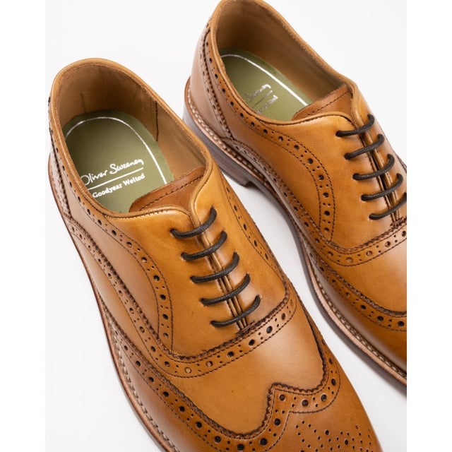 A Debonair Style And Timeless Design, The Tan Oliver Sweeney's Aldeburgh Lace-up Brogue Shoe Is A Must-have For The Modern Gentleman. Featuring A Luxurious Leather Upper With A High Quality Leather Sole, The Designer's Signature Branding And Fine Detailing, These Shoes Are Effortlessly Stylish.