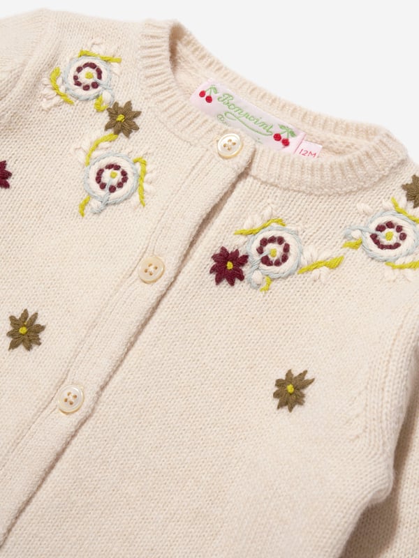 Bonpoint's grandiose aesthetics project impeccable construction and attention to detail. This baby girls vanille cardigan captures the French label's passion for high quality and precision of beauty. Made in spellbinding wool with a delicate embroidered pattern. Bonpoint Cherry Tag  Wool Embroidered Pattern Button Fastening  Ribbed TrimsBonpoint : Baby Height NB: 19" / 50cm 1M: 21" / 54cm3M: 23"/ 60cm 6M: 26"/ 67cm12M: 29" / 74cm 18M: 31"/ 81cm 2Y: 33"/ 86cm