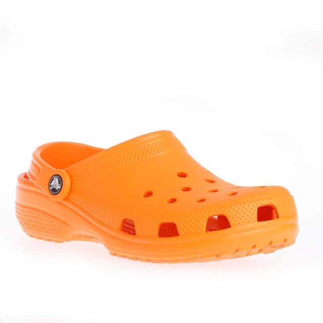 Juniors Crocs Classic Clogs in orange.- Slip on fastening.- Ventilation ports add breathability and help water and debris drain away.- Heel strap.- Fully molded Croslite™ material for signature Crocs comfort.- Lightweight  non-marking soles.- Ref: 20699183A