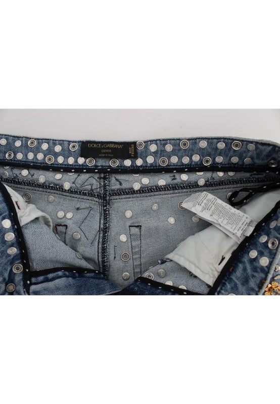 Gorgeous brand new Dolce & Gabbana blue wash crystal heart Roses embellished enchanted Sicily boyfriend fit jeans
  Made from a blend of 69% cotton 15% brass 5% crystal 5% zama 3% plastic 2% glass and 1% elastane
  Light blue wash with gold and silver metal detailing
  Zipper and button fly closure
  Multicolor crystal embellishments
  Two front pockets and back pockets
  Logo details
  Made in Italy
  Exclusive and rare one of a kind pair of jeans
Material: 69% Cotton 15% Brass 5% Crystal 5% Zama 3% Plastic 2% Glass 1% Elastane