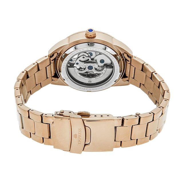 316L Surgical-Quality Stainless Steel Case; Jeweled Automatic Movement; Jewel Bearings: 19 Jewels; 36-Hour Power Reserve; Beats per Hour (BPH): 21600/Hour; Sapphire-Coated Mineral Crystal; Mother-of-Pearl Dial; Skeleton Dial; 12 Crystal Markers on Dial; Observation Caseback to view Movement; Jewel-Tipped Crown; 316L Surgical-Quality Stainless Steel Bracelet; Logo-Engraved Fold-Over Push-Button Deployment Clasp; Luminous Hands; 38mm Diameter; 10 ATM Water Resistance;
