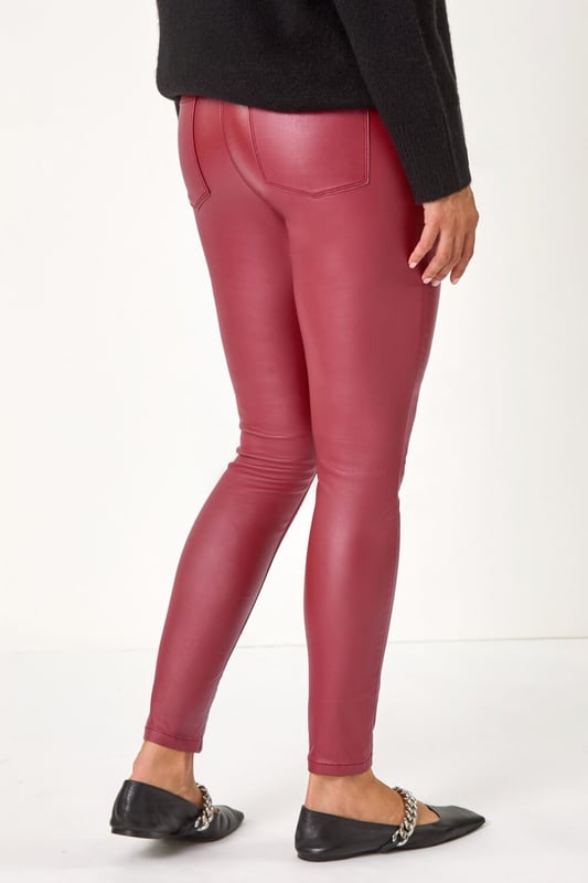 Coated Faux Leather Jeggings from Roman. A twist on the classic faux leather leggings, this pair have all the intricate details you would find on denim. Functional back pockets and belt loops make these jeggings practical and easy to style. They have flattering stitch detail for extra interest. Cut in a skinny style from a stretch woven fabric these are designed to pull on for fuss free fashion!