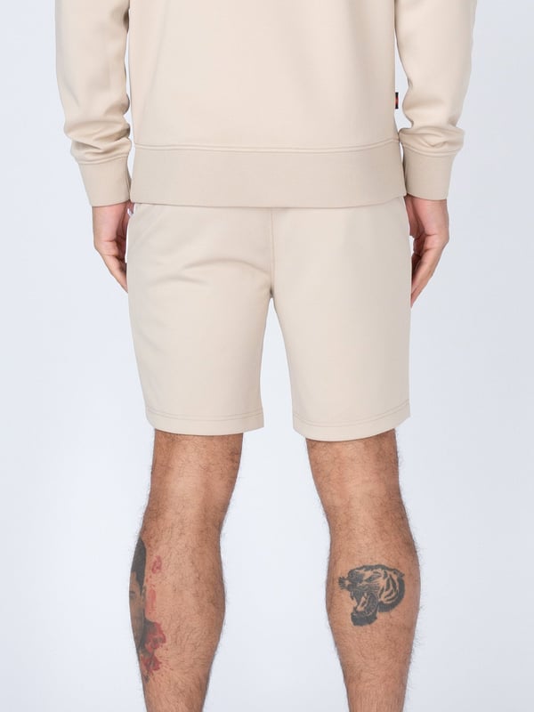 This comfy pair of shorts from LUKE are perfect for your laid-back looks. They're crafted from a classic tricot and are fitted with a comfy drawcord waistband for a customised fit. They feature essential front zip pockets and are detailed with contrast cut and sew panels. The brand's iconic lion head embroidery sits on the left leg to finish the look.