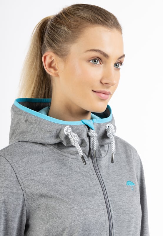 Futter: kein Futter/no lining, Füllung: keine Füllung,  Beschichtung: 100% Thermo-Polyurethan  Ein leichtes, dünnes Jersey-Material auf der Außenseite, volle Funktion in der Innenseite. Dafür sorgt eine Thermo-Polyurethan beschichtete Zwischenschicht, die die Innenseite warm und trocken hält. Ein weiterer Pluspunkt ist die sportliche Longform, die mit einem innen liegenden, elastischen Zugband auf Taille gezogen werden kann. Praktische Elemente wie die Kapuze mit Tunnelzug und Kordel, die Seitentaschen mit Druckknöpfen sowie der 2-Wege-Reißverschluss ergänzen das funktionale Design. Mit dieser Übergangsjacke sind Sie bei allen Aktivitäten an der frischen Luft bestens geschützt.  Funktionsjacke