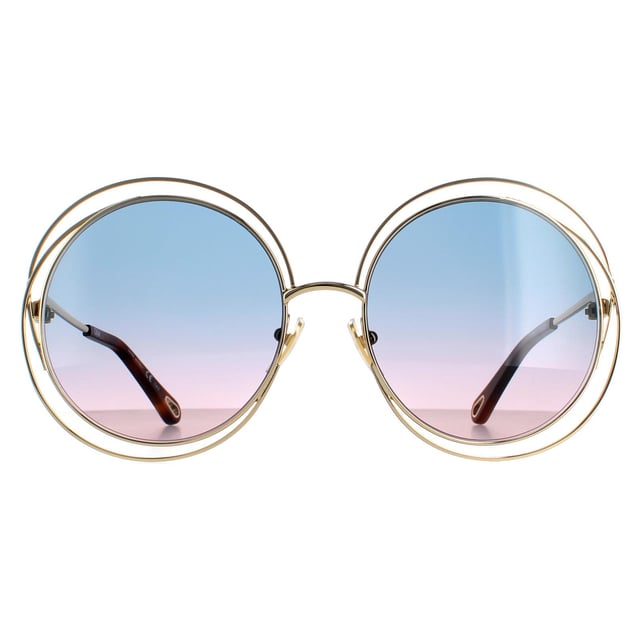 Chloe Round Womens Goudblauw roze gradiënt Ch0045S Zonnebril zijn een oversized ronde stijl met een sculpturaal bekabeld frame, siliconenneuspoten en tempels geëtst met het Chloe -logo.