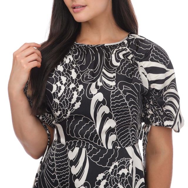 Womens Ted Baker Faridda Printed Puff Sleeve Mini Dress in black.Liven up your wardrobe with the retro inspired FARIDDA dress. With its stunning retro swirl print  tie-up back and beautiful ruched sleeves  the only question is: will you wear it to lunch or to a party?- A-line.- Short ruched sleeves.- Zip fastening.- Tie up back.- Lined.- Retro swirl print.- Shell: 100% Polyester; Lining; 100% Polyester.  Hand wash.- Ref: 268466BLACK
