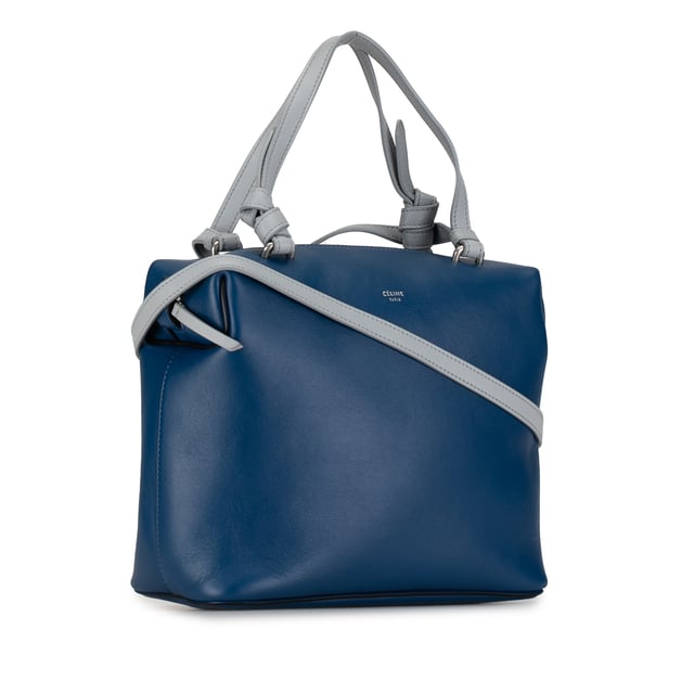 VINTAGE. RRP AS NEW. The Soft Cube satchel features a leather body, flat leather handles, a detachable flat leather shoulder strap, a top zip closure, and interior slip pockets.Interior Lining Worn. Practical Attachment Scratched. Zipper Scratched. 

Dimensions:
Length 20cm
Width 23cm
Depth 10cm
Hand Drop 15cm
Shoulder Drop 53cm

Original Accessories: Dust Bag, Dust Bag

Color: Blue
Material: Leather x Calf
Country of Origin: Italy
Boutique Reference: SSU257352K1342


Product Rating: VeryGoodCondition

Certificate of Authenticity is available upon request with no extra fee required. Please contact our customer service team.