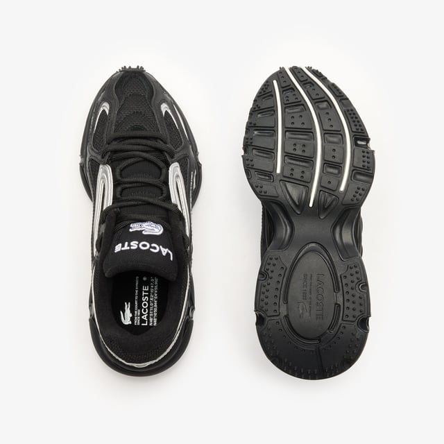 The L003 2K24 is the step to the future of Lacoste sneaker design language. This sneaker is built for today’s fashion-sneaker connoisseur - harnessing sport  style and tech features for a fresh and unique design aesthetic. The sporty mesh upper is layered with suede and multiple embossed metallic leather panels  harnessed by an outer cage which features the Lacoste Active branding details. The light EVA midsole features a dynamic shiny TPU stabiliser for support and stability together with a textured rubber outsole. • Progressive Running Sneaker • Breathable Mesh Upper with Synthetic overlays • Synthetic metallic panels with embossed detailing • Outer Synthetic Leather Cage design printed with Active Branding • EVA midsole with TPU support • Textured rubber outsole • Rounded rope laces • Mesh lining
