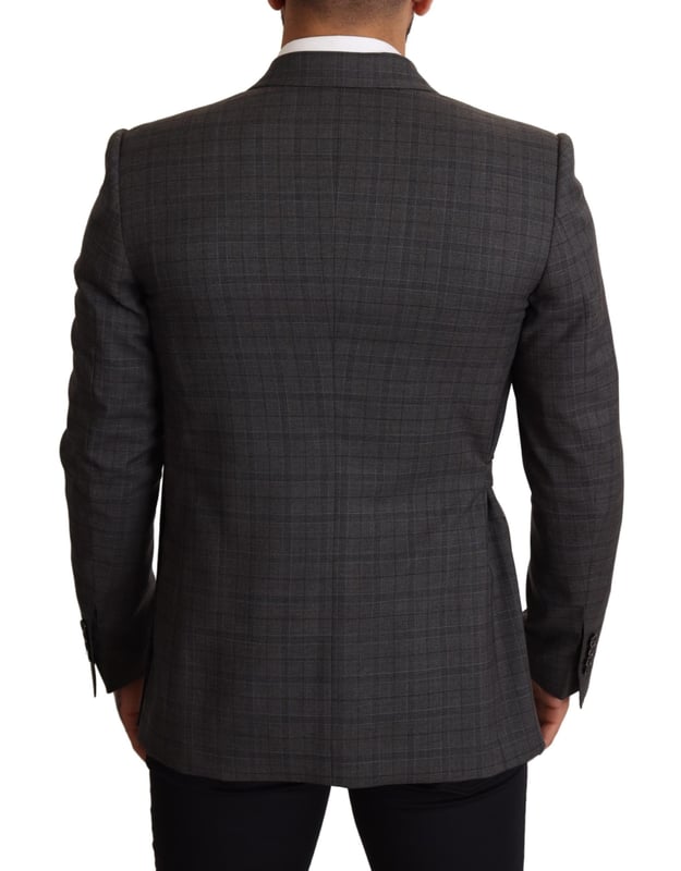 Brand: Dolce & Gabbana
  Model: MARTINI
  Style: Double breasted one button
  Fitting: Slim fit
  Color: Gray check
  Three outside pockets and two inside pockets
  One open vent in the back
  Logo details
  Made in Italy
  Material: 99% Wool 1% Elastane
  Lining: 100% Silk
Material: 99% Wool 1% Elastane
