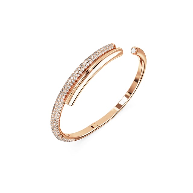 This dazzling Bracelet for Women from Swarovski is the perfect gift to spoil yourself or a loved one. The Bracelet is made out of Gold Plated Metal, colored Rose at Length: 17.4 cm weighing in at  grams with a Width of 6.3 cm at its widest point. The Swarovski 'Dextera' Women's Gold Plated Metal Bracelet - Rose 5692267 is delivered in a stunning gift box and carries a two year warranty.