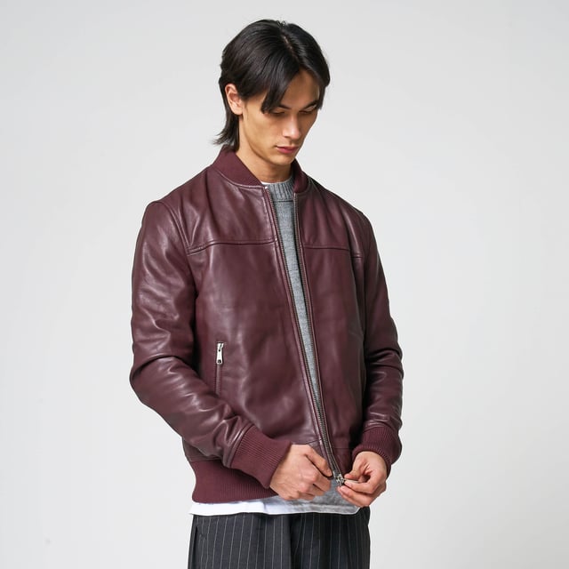 Men’s Barneys Originals real leather bomber jacket in burgundy. A bold pop of color for any occasion. Features a centre front zip, two zip pockets, and knit rib detailing on the cuffs and hem for a classic finish.