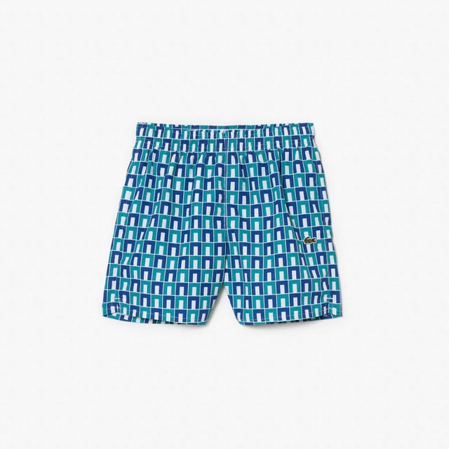 Monogram Print Swim Trunks Recycled polyester made from manufacturing offcuts Elasticated waist Embroidered crocodile on leg   Monogram Print Swim Trunks Recycled polyester made from manufacturing offcuts Elasticated waist Embroidered crocodile on leg