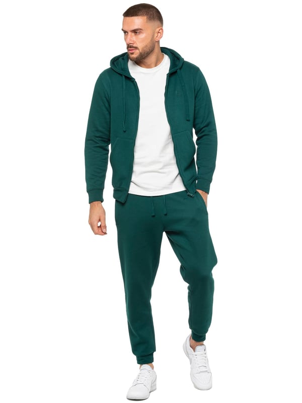 Enzo Herren Zip Hoodie Trainingsanzug Set. Normale Passform, langärmeliger Zip-Kapuzenpullover. Bündchen an den Handgelenken, verstellbare Kordelzüge. Mit EZ-Logo auf der Jogginghose. Normale Passform, Jogginghose mit Bündchen. Elastischer Bund mit verstellbarem Kordelzug. Mit 2 seitlichen Schlitztaschen und einer Gesäßtasche. Ideal für Freizeit- und Arbeitskleidung.