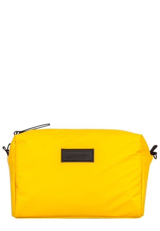 Constructed from our high quality splash proof tarpaulin to protect your essentials, the Mansville wash bag is a must have. It’s all in the detail with a specialist waterproof zip providing easy access to the main compartment. The interior features our wipe clean Consigned logo lining with double slip pockets and a large central compartment for all your essential cosmetic needs. Features: , Tarpaulin exterior, CONSIGNED rubberised patch logo, Waterproof zip feature, Zip top opening, CONSIGNED branded black interior Style Ref: 50329 YELLOW