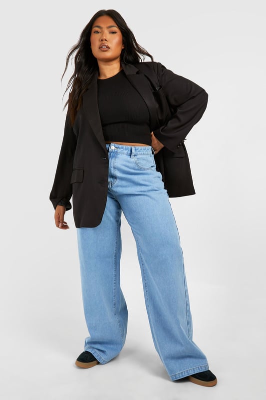 We've got your dream jeans covered with this latest pair from our plus size jeans collection. Made from a rigid denim that can be dressed up or down, these wardrobe staples are made with extra fabric to ensure the perfect fit. Pair with a relaxed-fit hoodie for off-duty days or team with a sparkly top and statement heels for a killer jeans-and-a-nice-top combo. Want more inspo? When it comes to versatile denim, plus size high waisted jeans are a perfect to show off your curves and flatter your waistline, just wear them with cropped jumpers or oversized t shirts. Style: Wide Leg JeansFabric: DenimModel's height: 170cm / 5'7"