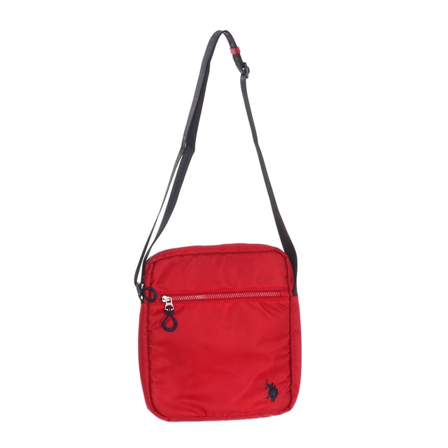 Men's shoulder bag from the U.S. POLO ASSN brand.
 Synthetic material exterior.
 Top zipper closure.
 Front exterior: One pocket with zipper closure.
 Rear exterior: One pocket with zipper closure
 Front interior: One pocket with zipper closure.
 Back interior: One open pocket.
 Adjustable strap with brand print.
 Brand logo on the front.
 Measures: 25x29x4cm
 Composition: 100% Nylon
 Care:
Clean with a wet cloth.