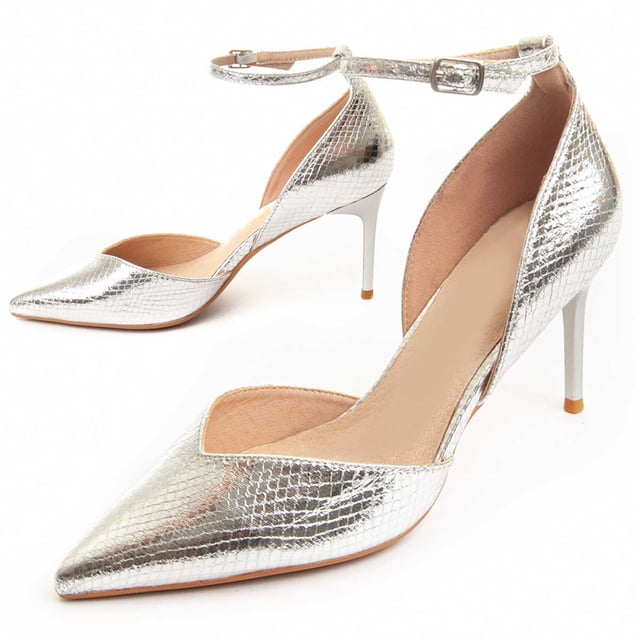 Women's dress shoe. Padded natural leather insole. Comfortable fit. Non-slip sole. Reinforced stitching. Manufactured by other brands for our brand. Approximate measurements: 10 cm heel.