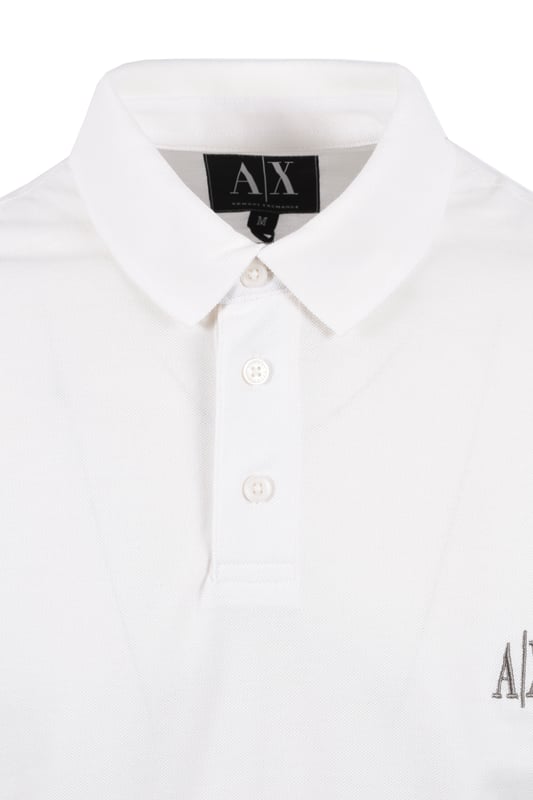 Armani Exchange Regular Polo Shirt in Off White
Enhance your casual wardrobe with the timeless sophistication of the Armani Exchange Regular Polo Shirt in a clean, off-white hue. This classic piece offers a refined yet relaxed style, perfect for everyday wear.
 
Features

Crafted from 100% soft and breathable cotton, ensuring exceptional comfort and durability.
Features a ribbed polo collar and ribbed cuffs on the short sleeves, providing a structured and polished look.
A three-button placket with branded buttons adds a touch of understated elegance. The signature Armani Exchange AX logo is meticulously embroidered in grey on the left chest, showcasing the brand's iconic style.
Regular Fit
Vented Hem
Style code: XM000367