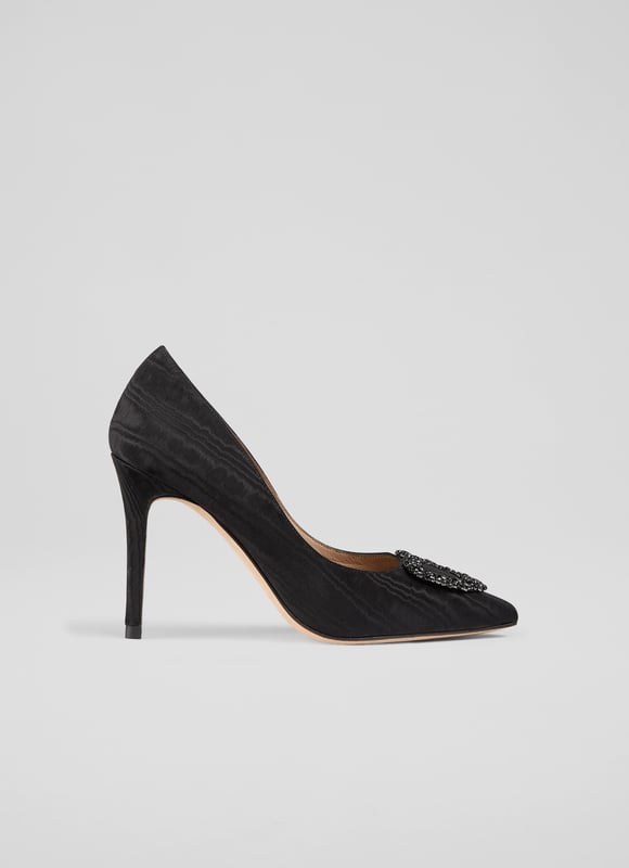 The Luella heart crystal court, in stunning black moirÃ© fabric, features a pointed toe and a sleek stiletto heel, all lined with luxurious leather. Pair these Spanish-made shoes with a stylish cocktail dress or enhance your favourite skinny jeans.