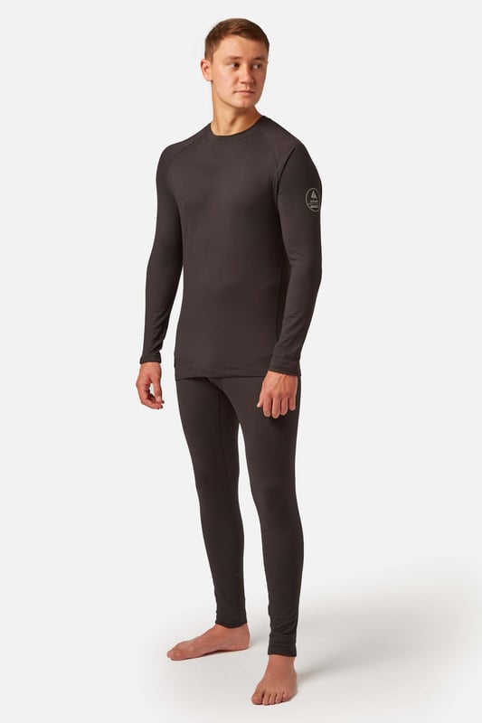 The key to staying warm whilst skiing or snowboarding is wearing layers, and it’s best to start with a base layer. The Surfanic CarbonDri® Collection Base layers are made from our unique Polyester CarbonDri® material which not only keeps the skin warm but is also highly breathable, naturally antimicrobial and odour resistant. This specially designed breathability allows sweat to absorb through the material and away from the skin and disperses it for maximum evaporation to keep you dry and comfortable at all times.

Moisture-Wicking, Heat Management, Odour Eliminating Performance Base Layers, and that's just the start...

    Odour Eliminating Properties - CarbonDri® antimicrobial properties help keep you and your base layer odour free.
    Heat Management - Specially carbon infused fibres speed up the evaporation of perspiration which in turn drives thermal stability
    Super Soft Hand Feel - Exceptional next to skin abrasion free comfort
    UV Protection - CarbonDri® base layers will provide Ultraviolet protection (UPF)50+
