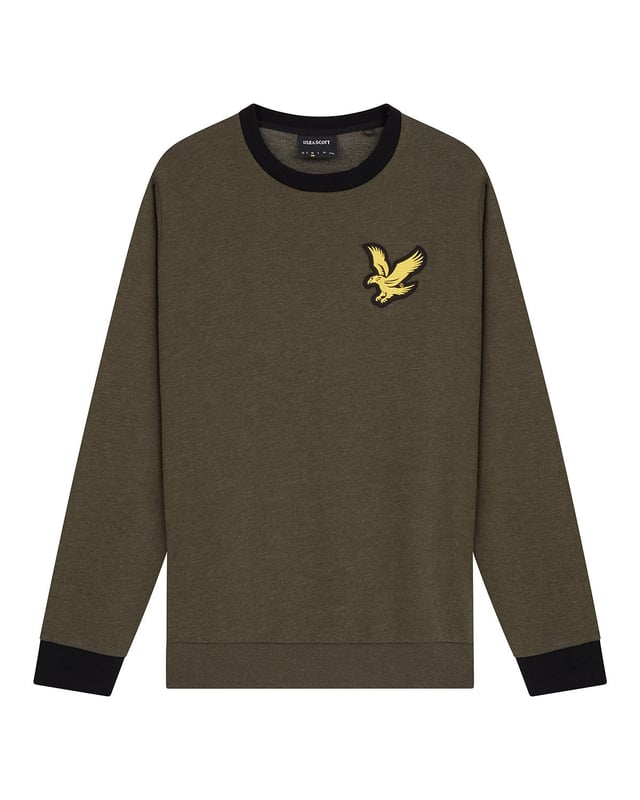 Suéter verde con logo de águila grande de Lyle & Scott. Manténgase cómodo y con estilo con el jersey Lyle & Scott Branded. Este jersey se ajusta a la talla real y presenta el logotipo de la marca Lyle & Scott. ¡Hacer una declaración nunca se vio ni se sintió tan bien! Dobladillo y puños elásticos, jersey de cuello redondo, suéter verde Lyle & Scott. 64% algodón, 36% poliéster, logotipo de la marca en el lado izquierdo del pecho. Ajuste regular, se ajusta a la talla real. Código de estilo: ML1727V W814