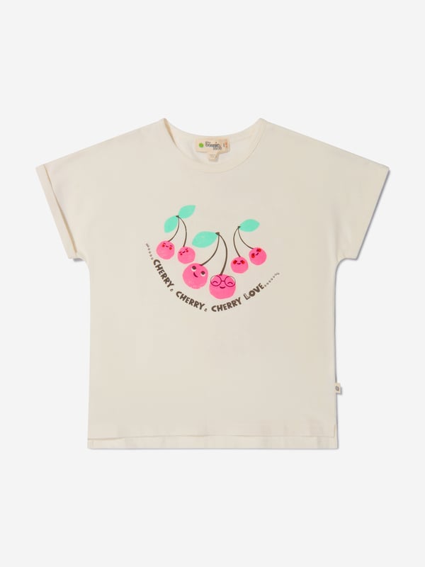 Introducing our Girls Organic Cotton Cherry Print T-Shirt from The Bonnie Mob in Pink, the perfect addition to your little girl's wardrobe. Made with love and care, this t-shirt is crafted from organic cotton, ensuring it is soft, comfortable, and gentle on her skin. Key Features: Made In Italy: This t-shirt is proudly made in Italy, guaranteeing the highest quality and attention to detail. Organic Cotton: We believe in sustainable fashion, which is why this t-shirt is made from organic cotton, reducing environmental impact. Cherry Print: The adorable cherry print adds a playful and cute touch to this t-shirt, perfect for your little girl. Flared Hem: Designed with a flared hem, this t-shirt offers a stylish and modern twist to a classic design. Long Waistband: The long waistband adds a touch of elegance and sophistication to this t-shirt. 'B' Motif: Featuring a golden 'B' motif, this t-shirt showcases The Bonnie Mob's signature logo, adding a touch of luxury to your little girl's outfit.Get ready to dress your little girl in style and comfort with our Girls Organic Cotton Cherry Print T-Shirt from The Bonnie Mob.