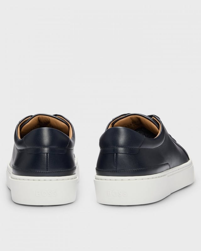 Elevated Italian-made trainers by BOSS. Featuring a branded lace loop and signature eyelets, this low-top pair is crafted in smooth leather.

Laces
Fully lined
Packaging: Box

100% Yak, 100% Cow skin, 60% Polyester, 40% Polyurethane, Sole: 100% Rubber, Upper material: 100% Cow skin, Innersole: 100% Calfskin
 
50536841
 