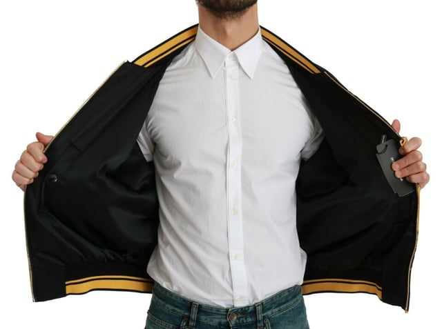 100% Authentic Dolce & Gabbana Bomber Jacket
  Black with multicolor pig motif
  2019 Year of the Pig Family inspired design
  Regular fit with zipper closure
  Two outside pockets and two inside pockets
  Dolce & Gabbana logo details
  Made in Italy with high craftsmanship
  Material: 100% Polyester Lining: 100% Polyester
Material: 100% Polyester