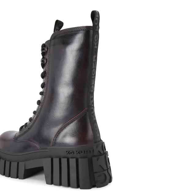The KG Kurt Geiger Tegan Lace Up boot is a black boot with wine upper which features a KG Kurt Geiger logo printed on ribbed textile with print stitch detailing can be seen at the tongue as well as a black rubber monocle on the tongue.