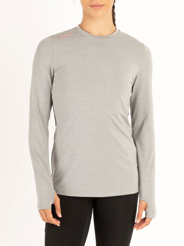 Train in style with this long sleeve crew neck top from the LUKE womenswear performance range. Cut from a high performance, recycled fabrication, it is designed with comfort, sustainability and flexibility in mind. The fabric has moisture absorbing properties and elastic fibres for ultimate support when on the move. This piece is complete with the brands iconic rubberised lion head badge.