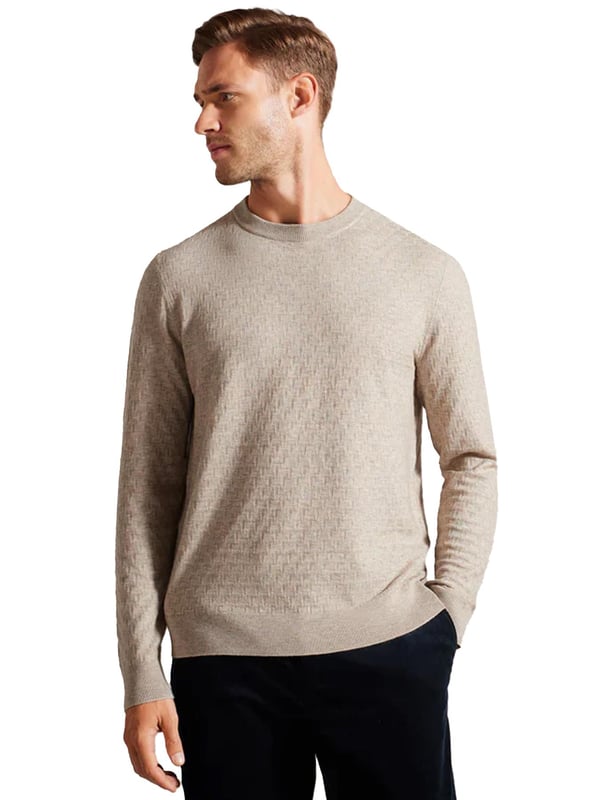 Der Ted Baker Pullover mit Rundhalsausschnitt ist fachmännisch aus einer hochwertigen Wollmischung gefertigt und verfügt über ein reichhaltiges, strukturiertes T-Strickmuster, das an kühleren Tagen mühelos einen Hauch von Eleganz verleiht. Die langen Ärmel spenden Wärme, während das klassische Rundhalsdesign zeitlosen Stil garantiert. Dieses vielseitige Stück eignet sich perfekt für verschiedene Anlässe.
